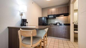 Fridge, microwave, stovetop, coffee/tea maker