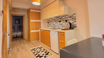 Fridge, stovetop, cookware/dishes/utensils