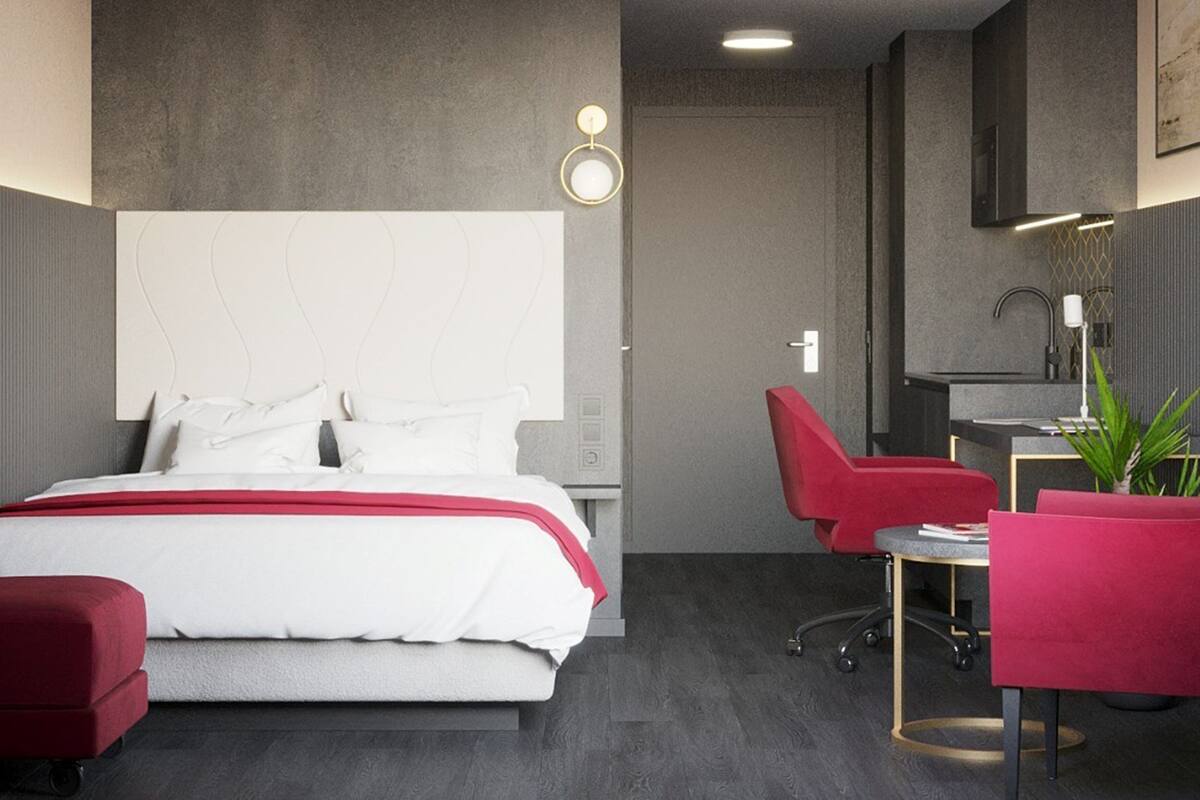 Kahden hengen deluxe-huone | Minibaari, tallelokero huoneessa, työpöytä