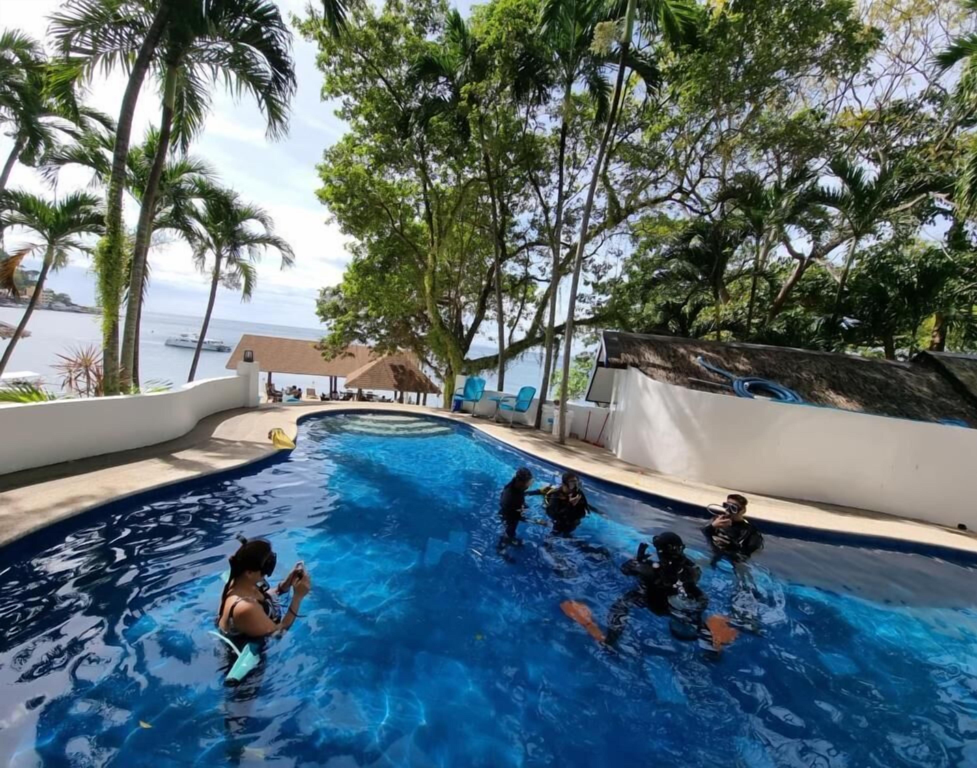 Family Quadruple Room | Pool | Outdoor pool