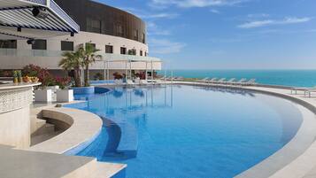 Outdoor pool, pool umbrellas, pool loungers
