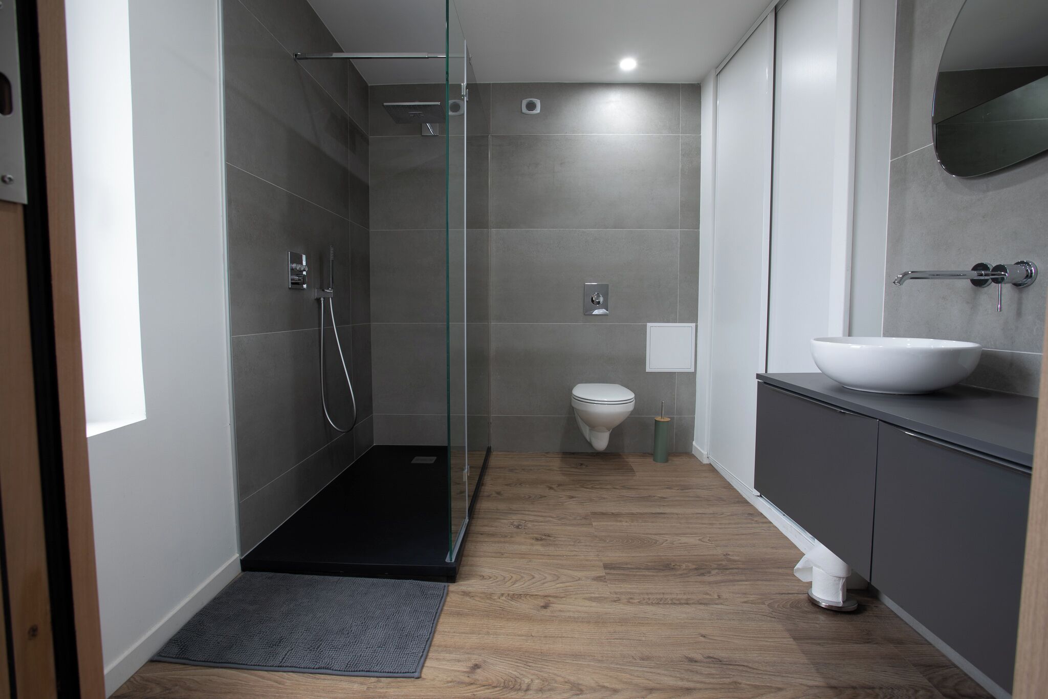 Shower, hair dryer, towels, toilet paper