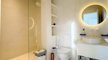 Hair dryer, towels, soap, shampoo