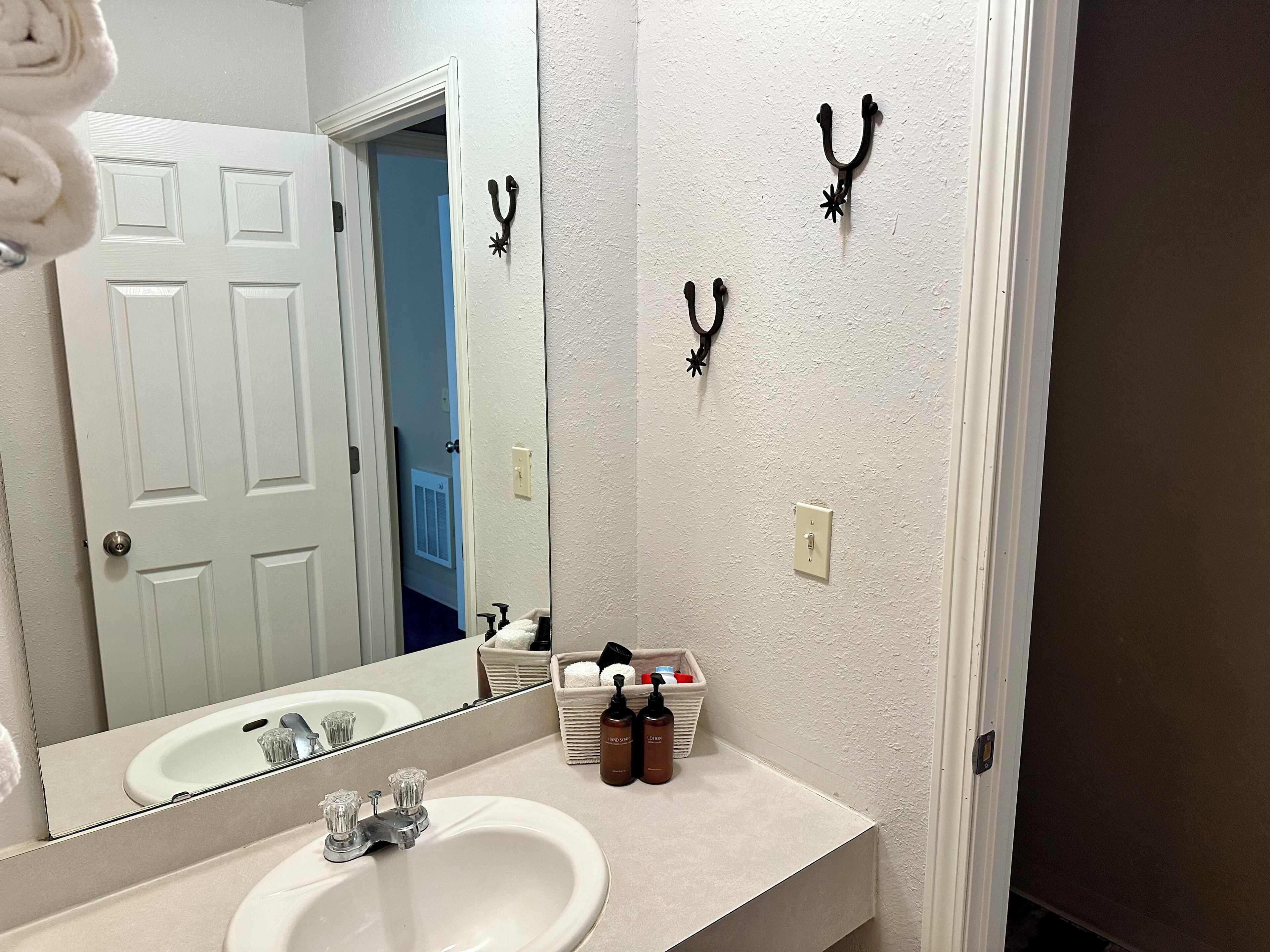 Hair dryer, towels, soap, shampoo