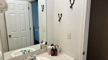Hair dryer, towels, soap, shampoo