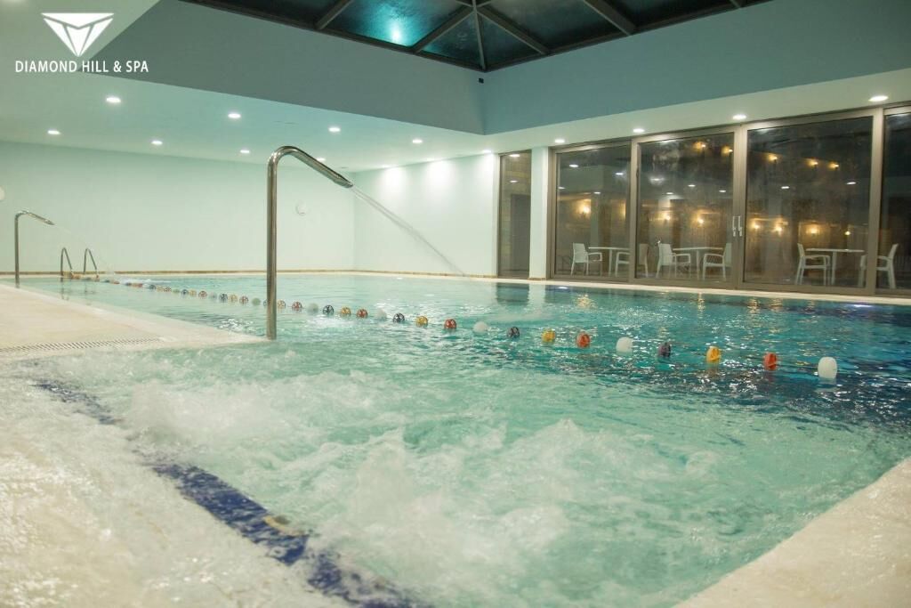 Indoor pool, seasonal outdoor pool, pool umbrellas