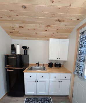 Fridge, microwave, coffee/tea maker, toaster