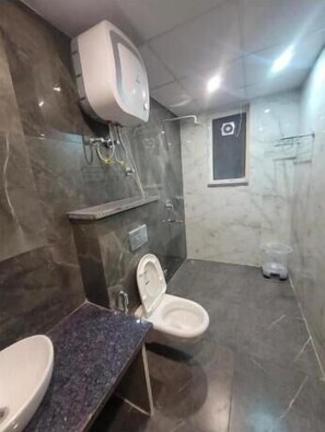 Deluxe kamer | Badkamer