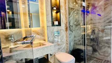 Shower, hair dryer, towels, soap