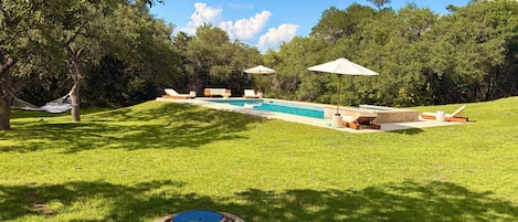 Outdoor pool, pool umbrellas, pool loungers
