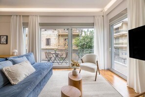 Appartamento Comfort, balcone, vista città | Area soggiorno