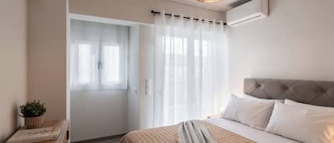 Laptop workspace, blackout drapes, soundproofing, iron/ironing board