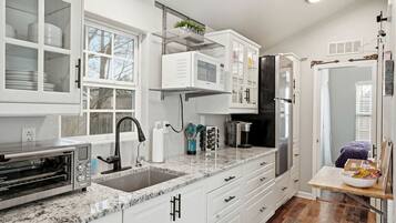 Fridge, stovetop, coffee/tea maker, toaster