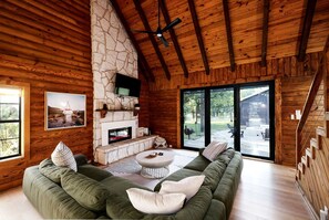 Living area - Luxury Fredericksburg Log Cabin with Heated Pool, Hot Tub & Game Room Near Main Street, Fredericksburg, TX (Fredericksburg)