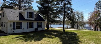 Amazing hilltop views of gorgeous Sage Lake with beach and boat launch access.