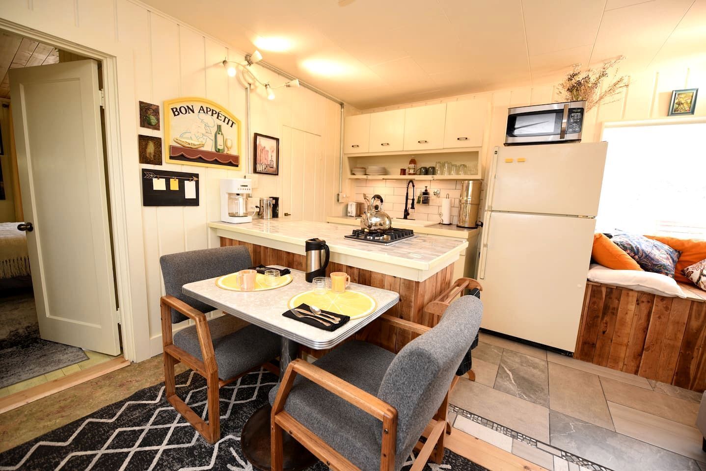 Fridge, microwave, stovetop, coffee/tea maker