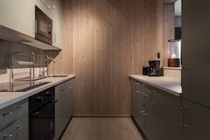 Apartment, 2 Bedrooms, Pets Not Allowed, Mountain View | Private kitchen | Fridge, microwave, oven, stovetop - Nyhem - Funäsdalens by (Funäsdalen)