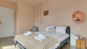 Family Apartment, Balcony, Courtyard View | Individually decorated, laptop workspace, iron/ironing board