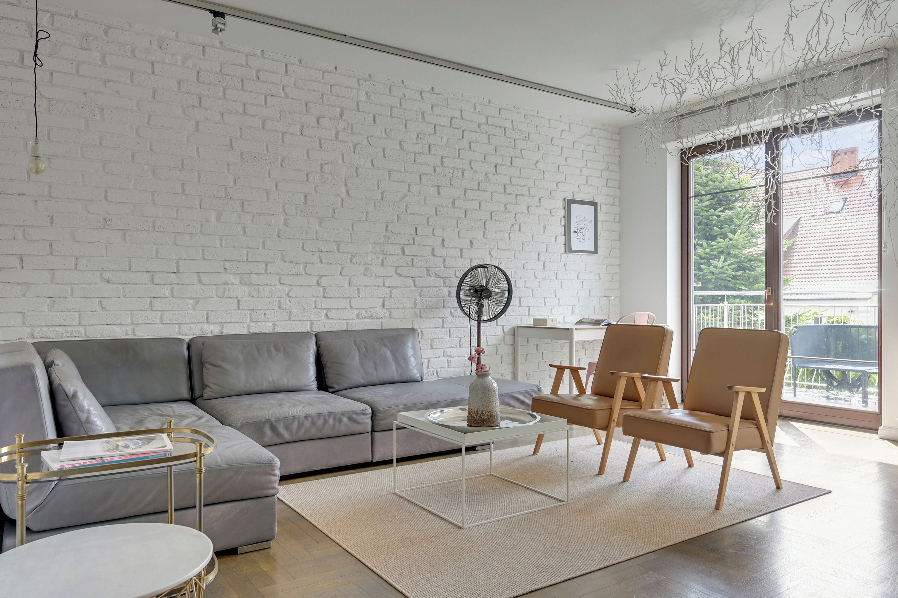 Family Apartment, Balcony, Courtyard View | Living area | 40-inch flat-screen TV with cable channels