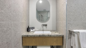 Shower, hair dryer, slippers, towels