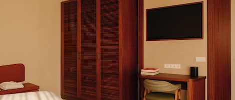 Premium bedding, down comforters, pillowtop beds, minibar