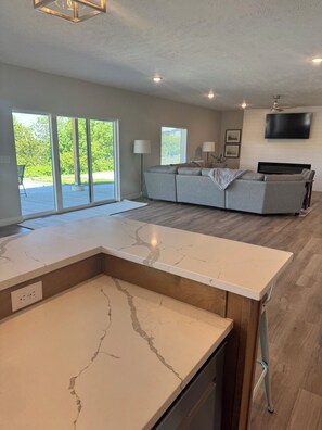 Interior - Fully furnished lake house with cozy spaces, full kitchen, and lake views. (Crofton)