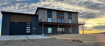Fully furnished lake house with cozy spaces, full kitchen, and lake views.