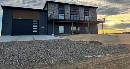 Fully furnished lake house with cozy spaces, full kitchen, and lake views.