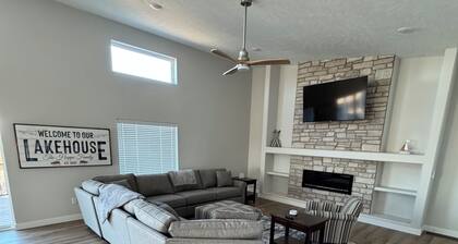 Fully furnished lake house with cozy spaces, full kitchen, and lake views.