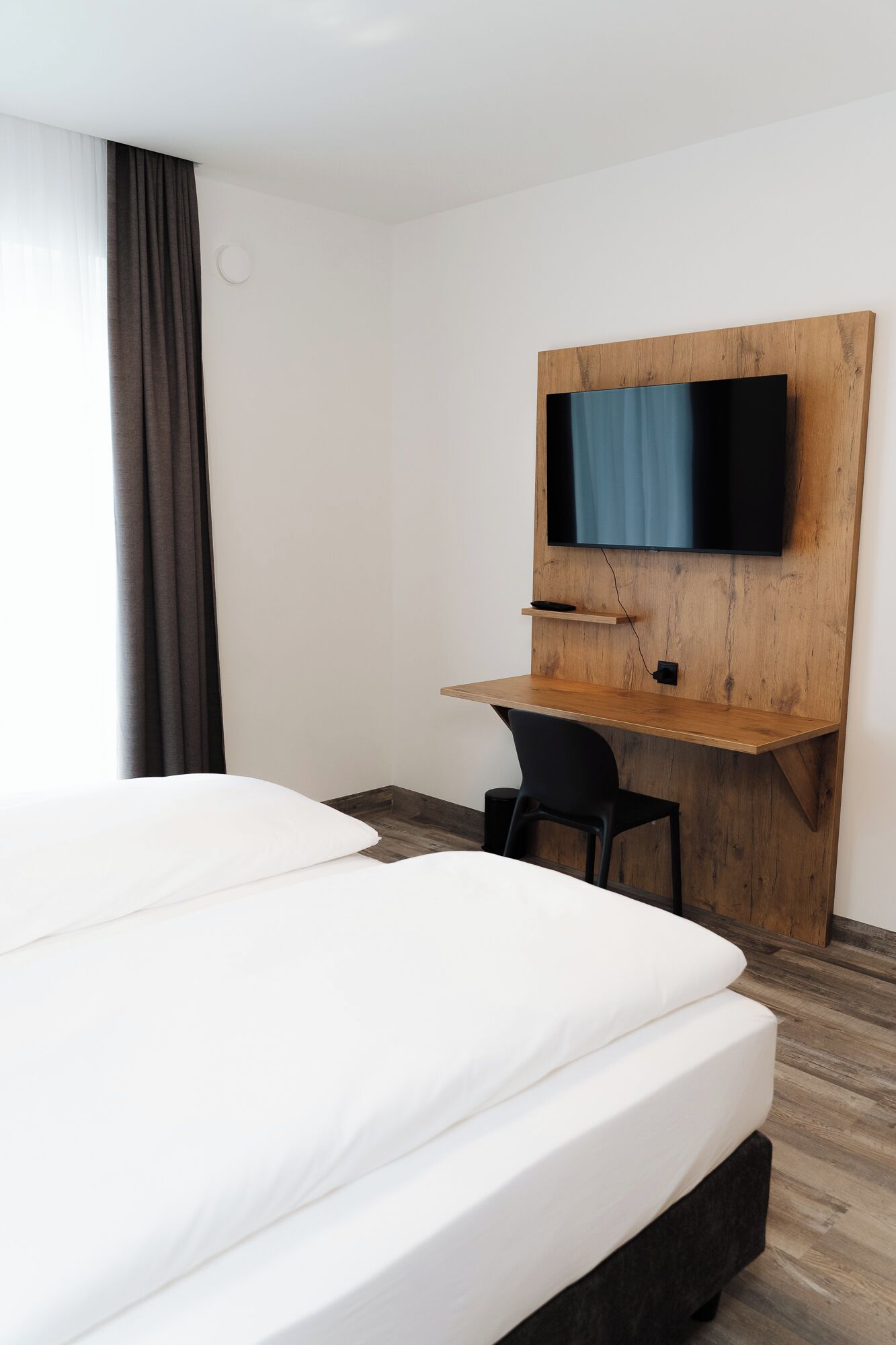 Habitación individual Confort, balcón | Escritorio, tabla de planchar con plancha y wifi gratis 