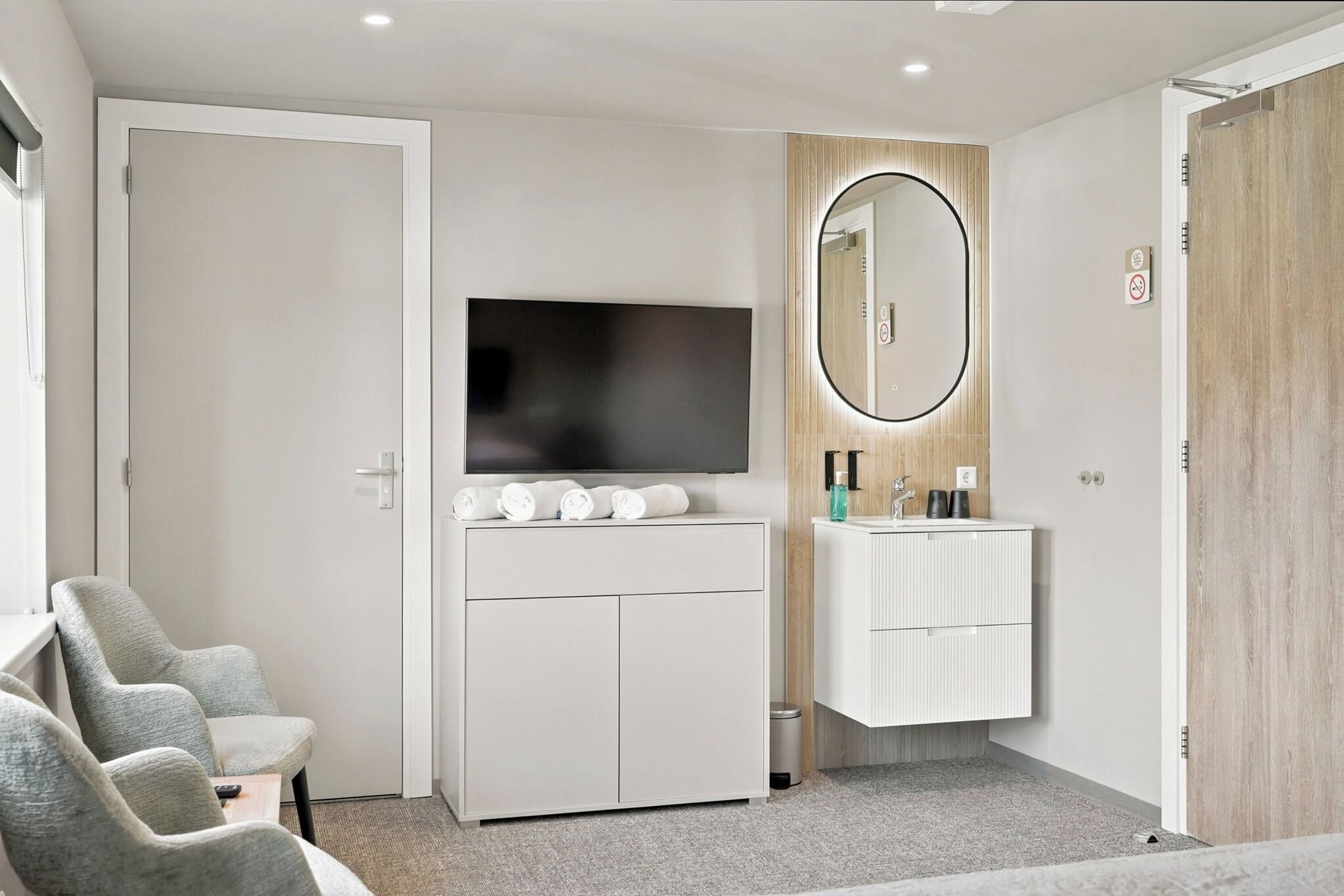 Deluxe Double Room | Living area | 55-inch TV with digital channels