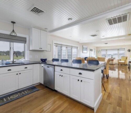 Luxury waterfront condo in Historic Jamestown, RI, steps to the beach.