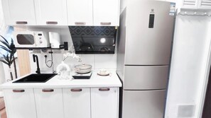 Suite Comfort, vista città | Cucina privata