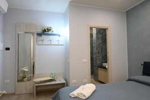 Doppia Comfort | Una cassaforte in camera, tende oscuranti, ferro/asse da stiro