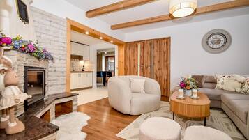 Chalet with Private Hot Tub | Living area | Flat-screen TV