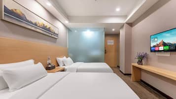 Standard Twin Room | Desk, laptop workspace, blackout drapes, free WiFi