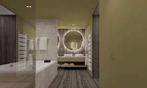 A modern bathroom with a bathtub, two sinks, a large mirror, and a towel rack. - NaturHotel Snovik (Kamnik)