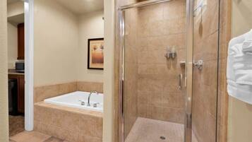 Shower, hair dryer, towels, shampoo