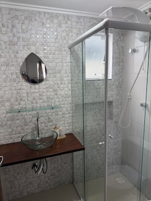 Shower, towels, toilet paper