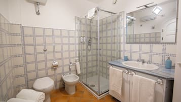 Double Room, 1 King Bed with Sofa bed | Bathroom | Shower, hair dryer, towels, soap