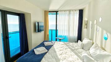Appartamento Deluxe, vista mare | Biancheria da letto di alta qualità, materassi a doppio strato