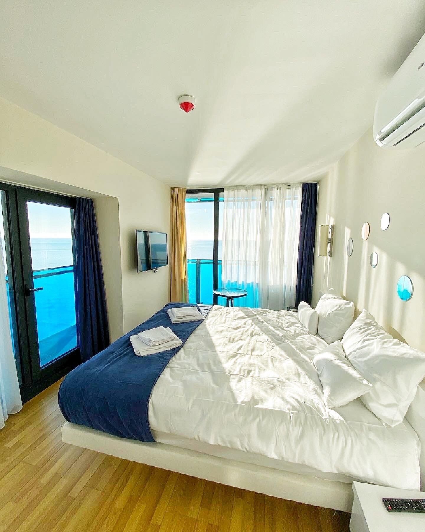 Deluxe-Apartment, Meerblick | Hochwertige Bettwaren, Pillowtop-Betten, Verdunkelungsvorhänge