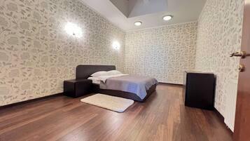 Luxury Suite, Non Smoking | Premium bedding, minibar, in-room safe, blackout drapes