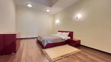 Luxe suite, niet-roken | Luxe beddengoed, een minibar, een kluis op de kamer