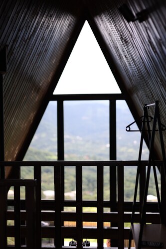 a cozy house with a beautiful view of the mountains