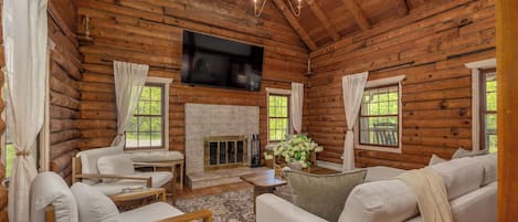 Smart TV, fireplace, foosball, books
