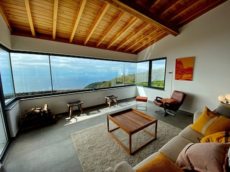 TV, fireplace. Casa da Vista Mar: Sea View, Wi-Fi, and Air Conditioning in Angra do Heroísmo