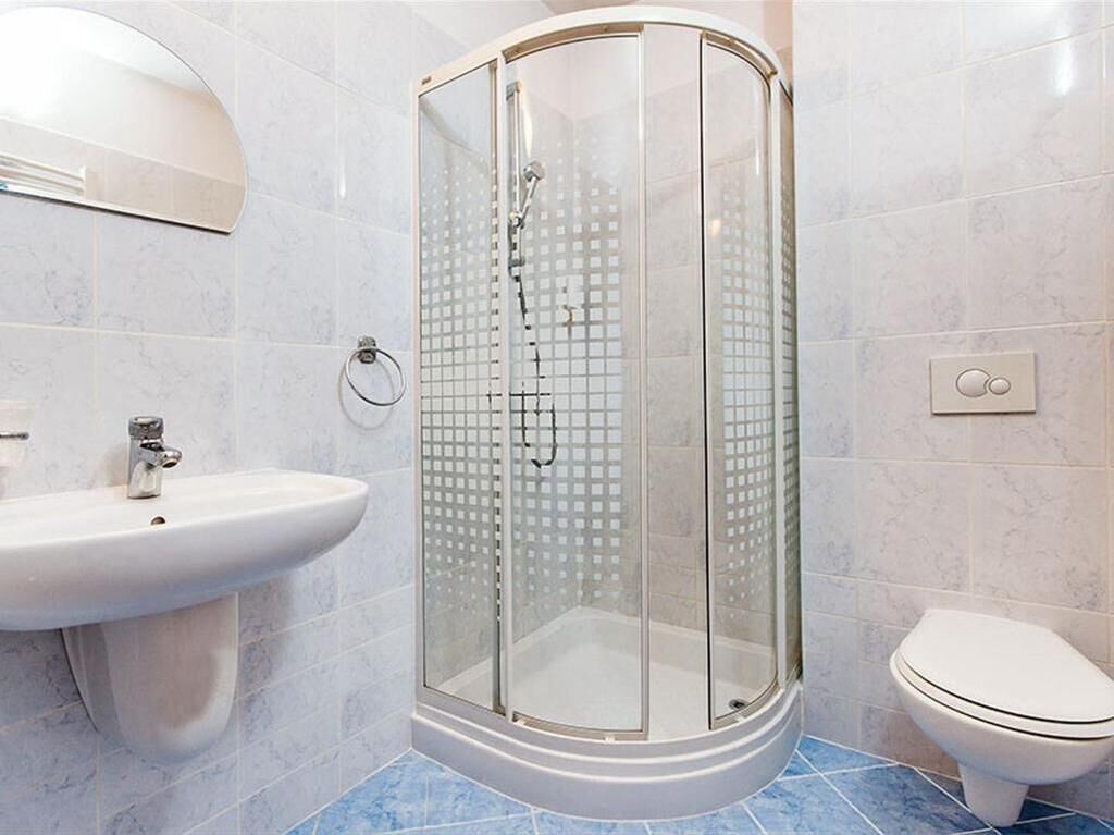 Triple Room | Bathroom | Hair dryer, towels, soap, shampoo