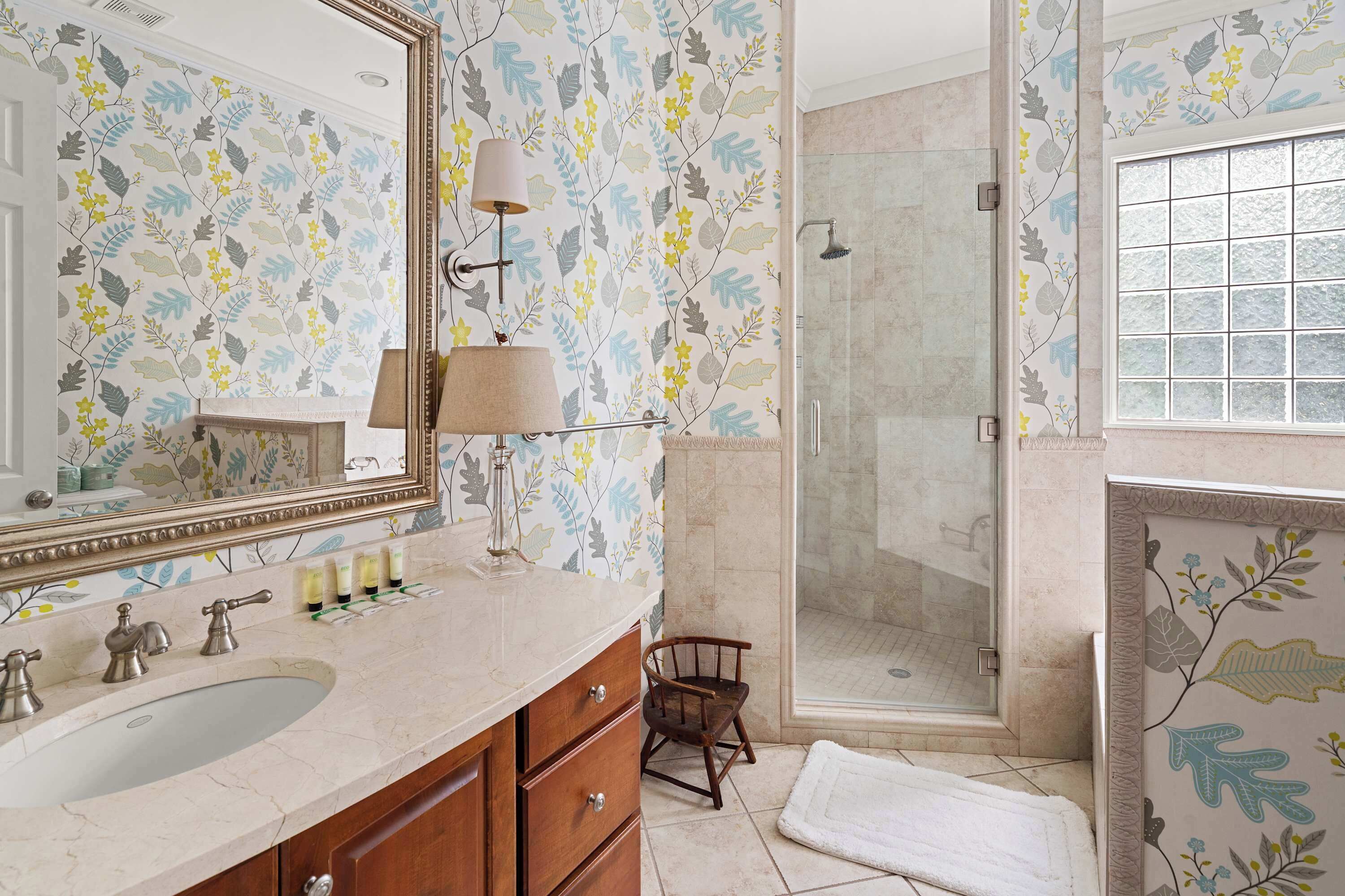 Shower, hair dryer, towels, shampoo