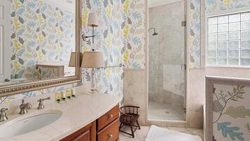 Shower, hair dryer, towels, shampoo
